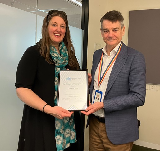 OsteoBA Chair Nikole Grbin receives certificate of recognition from Ahpra CEO Martin Fletcher